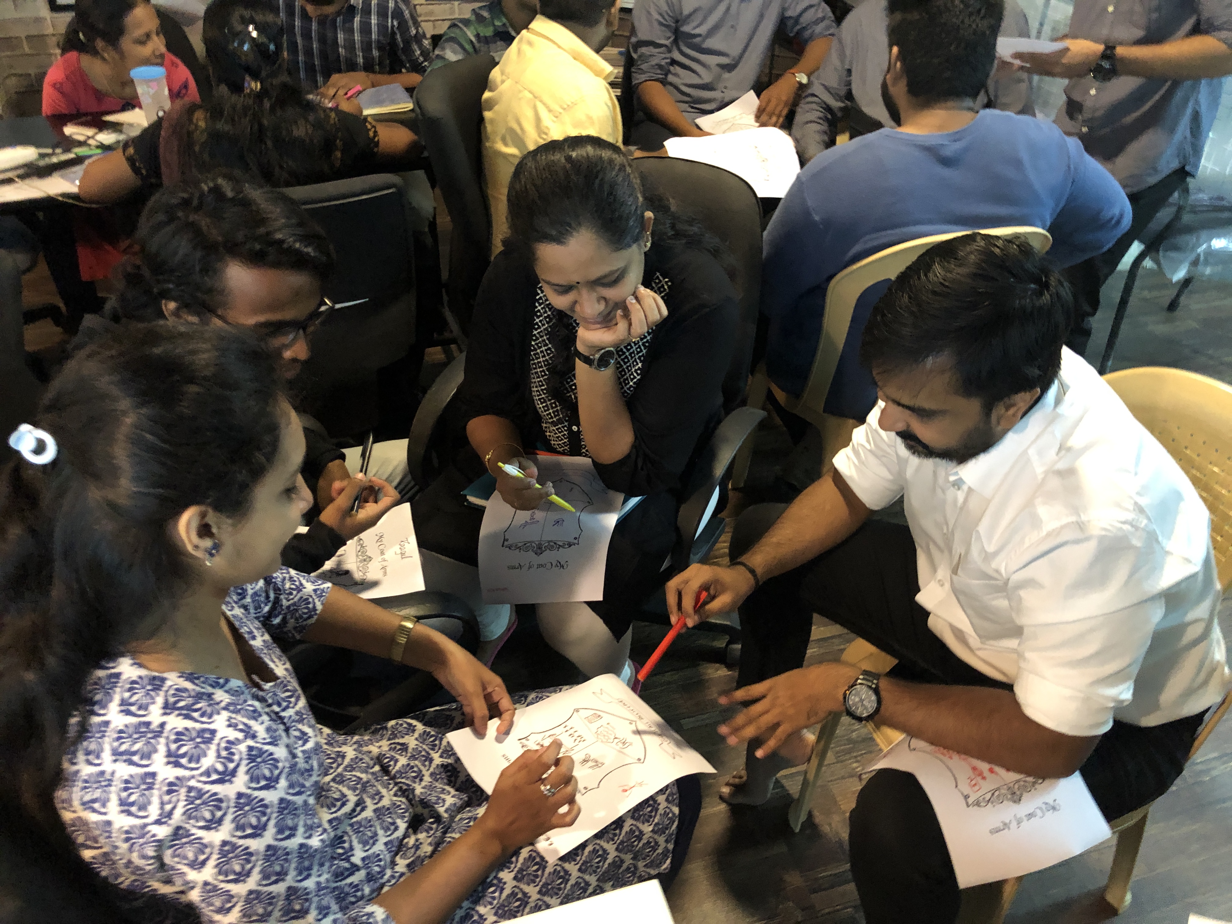 Workshop participants discussing their ideas and notes together